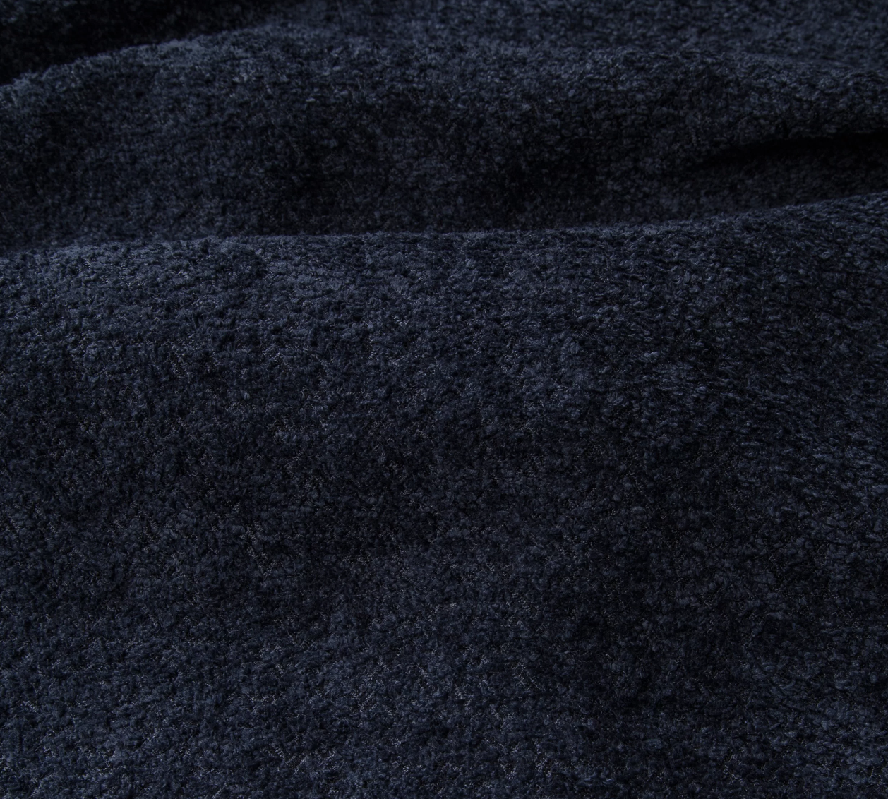 Narożnik Montivo L kształtny- z funkcja spania i pojemnikem na pościel tkanina boucle