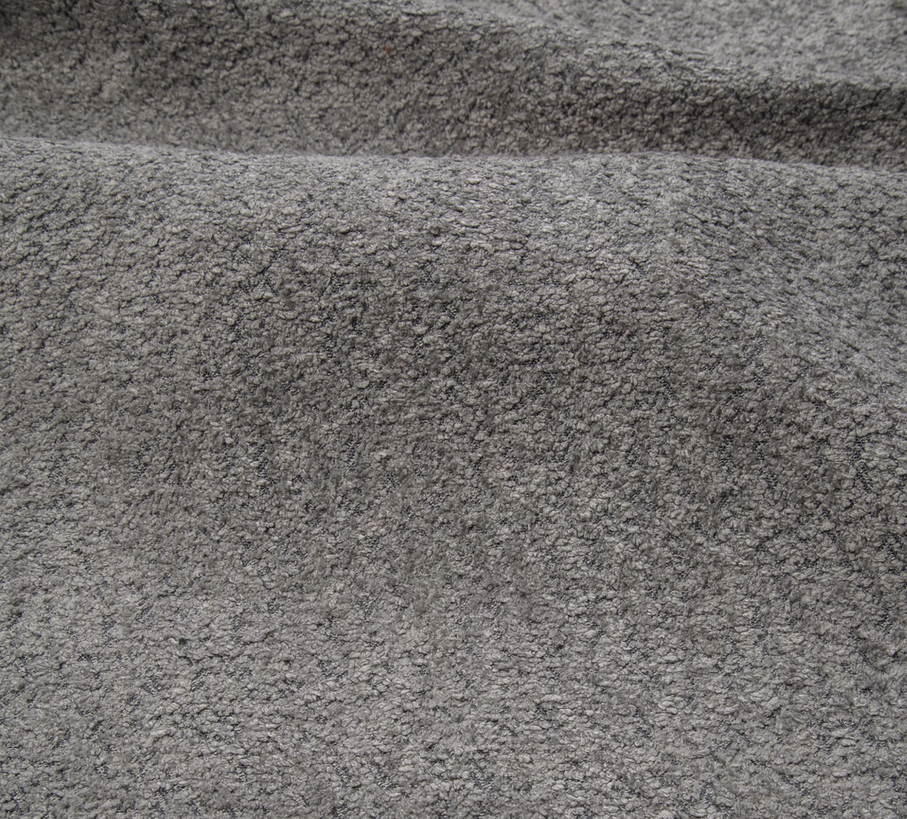 Narożnik Montivo L kształtny- z funkcja spania i pojemnikem na pościel tkanina boucle